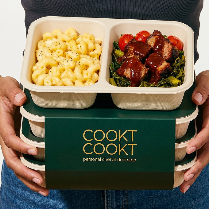 COOKT meal boxes held in hands